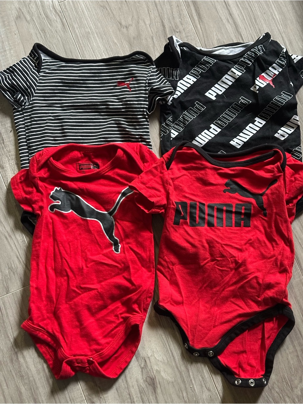 Black and red Puma bodysuits size 12 Months - set of 4